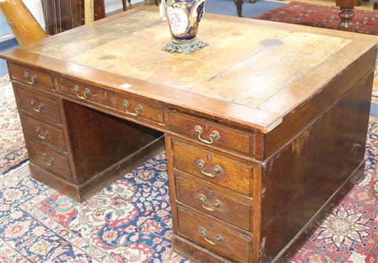 A 19th century oak pedestal desk, W.153cm